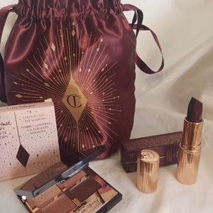 Charlotte Tilbury cosmetic bag with products